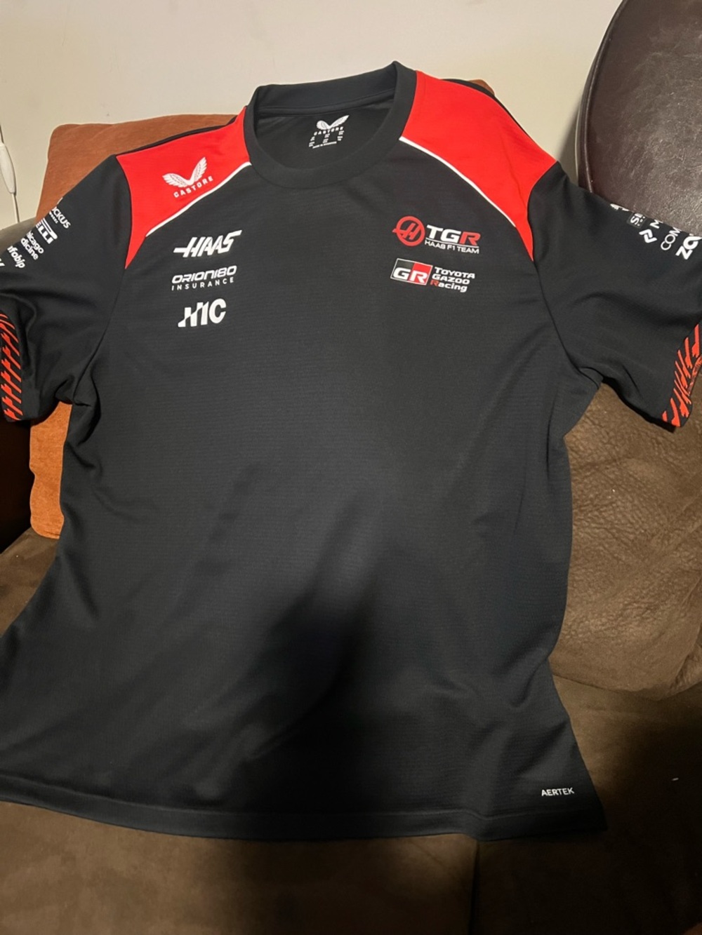 Official 2026 Haas F1 Team Set Up T-Shirt, designed by Castore men’s size 2XL